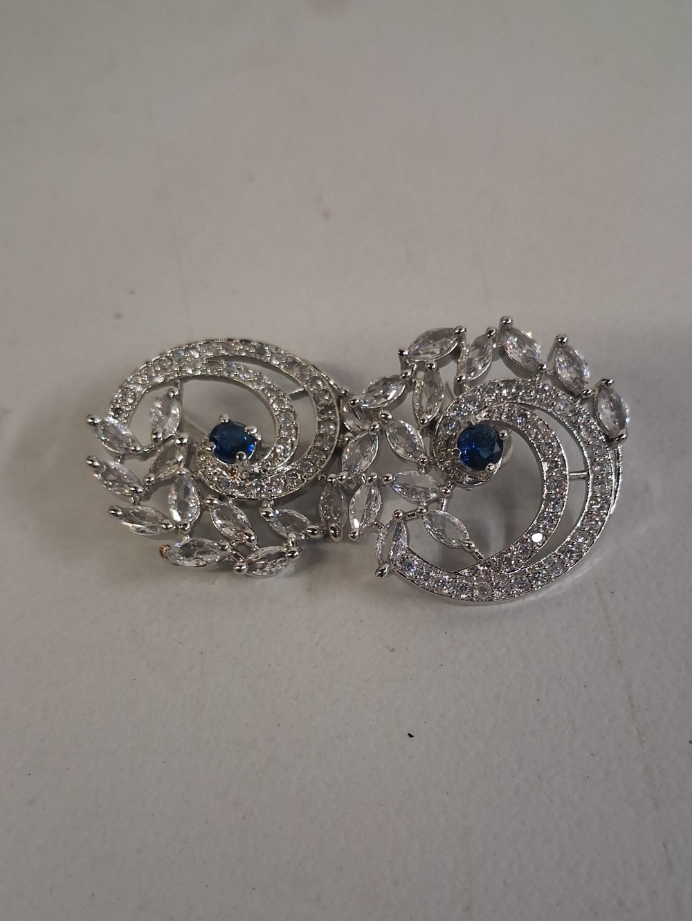 Silver-Tone Crystal Swirl Earrings with Blue Centerstones